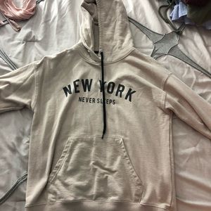 very light tan new york cit sweatshirt